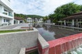 Luxury residential house reflected on the swimming pool calm and clear water