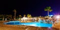 Luxury resort pool in the evening. Royalty Free Stock Photo