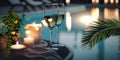 Luxury resort pool palm plant and candles glasses of wine ,with tropic roses flowers spa relaxing Royalty Free Stock Photo