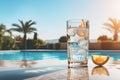 Luxury resort poolside. savor a summer cocktail amidst stylish poolside accessories Royalty Free Stock Photo