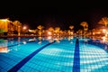 Luxury, resort swimming pool in night Royalty Free Stock Photo