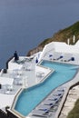 Luxury resort swimming pool in Santorini, Greece Royalty Free Stock Photo