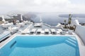 Luxury resort swimming pool in Santorini, Greece Royalty Free Stock Photo