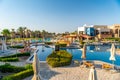 Luxury resort with swimming pool, sun loungers and beach umbrellas