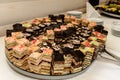 Luxury rich delicious cakes on wedding table at the reception,