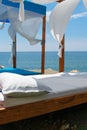 Luxury and romantic bed on the seashore for relaxing holidays