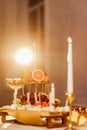 Luxury romantic candlelight dinner table setup for couple in ocean view restaurant on Valentine's day with Champaign Royalty Free Stock Photo