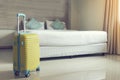 Luxury Room with yellow luggage suitcase on Travel Concept. Special Room with luggage bag and bed in luxury hotel. Honey moon trip