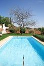 Luxury rustic hotel and swimming pool in countryside Royalty Free Stock Photo