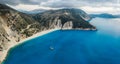 Luxury Sail Yacht in Myrtos beach with blue bay on Kefalonia Island, Greece. Aerial panoramic photo Royalty Free Stock Photo