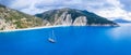 Luxury Sail Yacht in Myrtos beach with blue bay on Kefalonia Island, Greece. Aerial panoramic photo Royalty Free Stock Photo