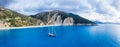 Luxury Sail Yacht in Myrtos beach with blue bay on Kefalonia Island, Greece. Aerial panoramic photo Royalty Free Stock Photo