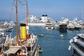 Luxury Sailboat With Cruise Liner in The Background