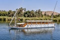 Small cruise boat with two sails on the Nile