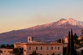 Luxury San Domenico Palace Hotel with panoramic view on snow capped Mount Etna volcano and Mediterranean sea in Taormina, Sicily Royalty Free Stock Photo