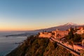 Luxury San Domenico Palace Hotel with panoramic view on snow capped Mount Etna volcano and Mediterranean sea in Taormina, Sicily Royalty Free Stock Photo