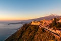 Luxury San Domenico Palace Hotel with panoramic view on snow capped Mount Etna volcano and Mediterranean sea in Taormina, Sicily