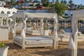 Luxury sand beach with beach chairs in tropical resort in Red Sea coast in Sharm El Sheikh, Egypt, Africa Royalty Free Stock Photo