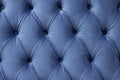 luxury seamless background of velvet blue fabric on upholstered furniture close-up Royalty Free Stock Photo