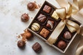Luxury set of handmade chocolates in a gift box decorated with ribbon Royalty Free Stock Photo