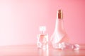 Luxury set of organic perfumes on pink background Royalty Free Stock Photo