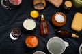 Luxury Set of spa products with accessoires on black background. top view