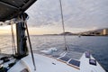 Luxury solar powered catamaran, fully sustainable and powered by solar energy, charging batteries aboard a sailboat