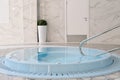 Luxury spa center with whirpool or jacuzzi bathtube. Royalty Free Stock Photo