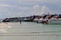 Luxury speed boats moored on a tropical beach Royalty Free Stock Photo