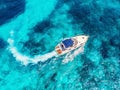 Luxury speed motor boat. Clear blue turquoise water. Aerial view Royalty Free Stock Photo