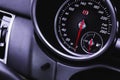 Luxury speedometer in sport car close-up view wallpaper, glowing red indicators