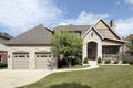 Luxury stone home with front porch Royalty Free Stock Photo