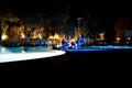 Luxury Summer Resort with Pool with a Fountain. Live performance from a Band in a Peaceful Atmospheric Night in a Nature