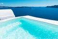 Luxury swimming pool with sea view. Santorini island, Greece