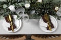 Luxury table setting with beautiful decor and blank cards. Festive dinner Royalty Free Stock Photo