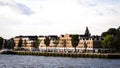 Townhouses along the Nieuwe Maas river at Rotterdam, Holland