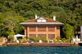 Luxury and traditional mansion red by the sea in the Bosphorus, Turkey Istanbul June 22 2019