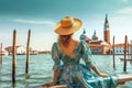 Luxury travel woman looking panorama. Sun hat maxi dress woman relaxing sea view in Venice, Italy. Destination Europe. Concept web Royalty Free Stock Photo