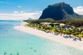 Luxury tropical beach and Le Morne mountain in Mauritius. Beach with coconut palms and transparent ocean. Aerial view Royalty Free Stock Photo