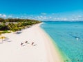 Luxury tropical beach in Mauritius. Holiday beach with palms and ocean. Aerial view Royalty Free Stock Photo