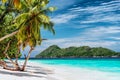 Luxury vacation scene on tropical island. Paradise beach with white sand and palm trees. Long distance travel tourism Royalty Free Stock Photo