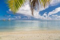 Luxury vacation. Summer beach in Maldives island, palm leaf and water villas. Amazing scenery, sea and white sand under blue sky