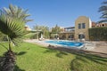 Swimming pool at a luxury tropical holiday villa Royalty Free Stock Photo