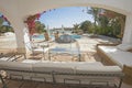 Swimming pool and outdoor seating area at a luxury tropical holiday villa