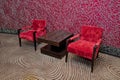 Luxury vintage red armchair on red background