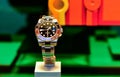 Luxury watch Rolex root beer gmt master II gold stainless steel displayed in a \