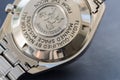 Luxury watch serial number on an Omega Speedmaster.