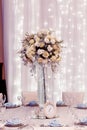 Luxury wedding decor with flowers and glass vases and number one Royalty Free Stock Photo