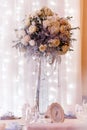 Luxury wedding decor with flowers and glass vases and number of Royalty Free Stock Photo