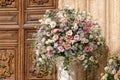 Luxury wedding floral decorations at the entrance of Ostuni church. Royalty Free Stock Photo